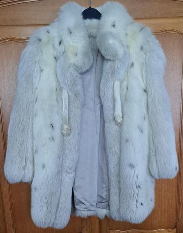 gevlekte vintage bontjas beschikbaar voor biedingen