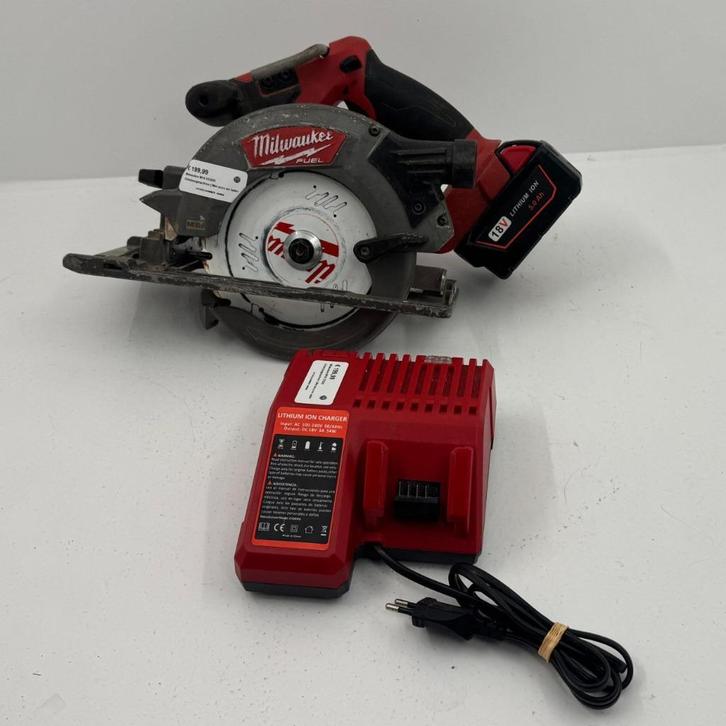Milwaukee M18 CCS55 Cirkelzaagmachine | Met accu en lader, Doe-het-zelf en Verbouw, Gereedschap | Zaagmachines, Gebruikt, Decoupeerzaag