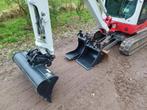 Takeuchi TB216 bj 2019 2536uur Nieuw bakkenset, Zakelijke goederen, Machines en Bouw | Kranen en Graafmachines, Ophalen of Verzenden