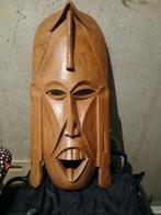 Mooi hout masker, Ophalen
