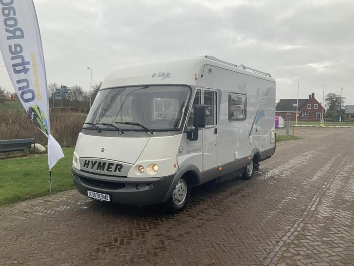 Hymer B 584 2.8 JTD 128 PK Integraal, Motor-airco, Hef-bed v, Caravans en Kamperen, Campers, Bedrijf, tot en met 3, Integraal