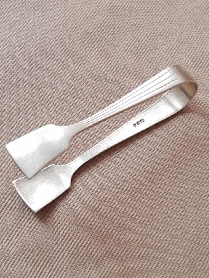 Verzilverde suikerklontjestang - Douwe Egberts - 90, Antiek en Kunst, Antiek | Bestek, Ophalen of Verzenden