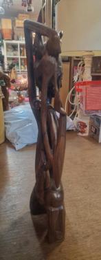 Houten Afrikaans Beeld, Ophalen