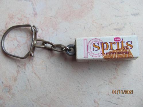 VINTAGE reclame AHO koek Sprits SLEUTELHANGER 60 70 IZGS, Verzamelen, Sleutelhangers, Gebruikt, Merk, Ophalen of Verzenden