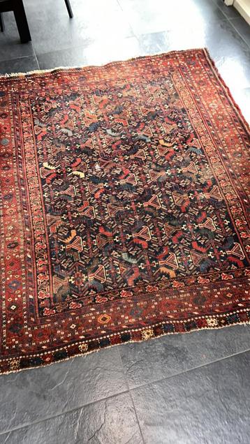 Handgeknoopt Perzisch tapijt. 