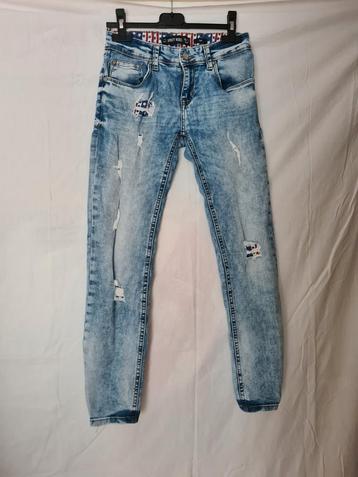 "STREET REBEL" Jeans met gehavende details. Mt.146.Als nieuw beschikbaar voor biedingen