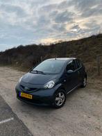 Toyota Aygo 1.0 12V Vvt-i 3DRS MMT 2006 Grijs, Auto's, Toyota, Voorwielaandrijving, Stof, Zwart, 4 stoelen