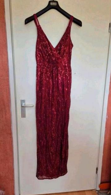 Nieuwe rode glitterjurk maat M. Okselmaat 40.5 cm. beschikbaar voor biedingen