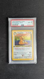 Fossil 4/62 Dragonite Holo [1st edition] PSA 8, Hobby en Vrije tijd, Verzamelkaartspellen | Pokémon, Ophalen of Verzenden, Zo goed als nieuw