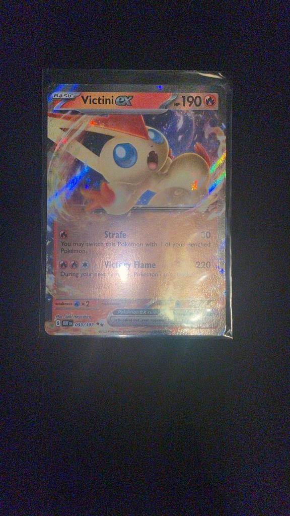 Victini ex OBF 033/197, Hobby en Vrije tijd, Verzamelkaartspellen | Pokémon, Nieuw, Losse kaart, Foil, Ophalen of Verzenden