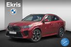 BMW iX2 xDrive30 M Sport Pro Trekhaak / Panorama Dak / Harma, Auto's, BMW, Automaat, Lichtsensor, Zwart, Vierwielaandrijving