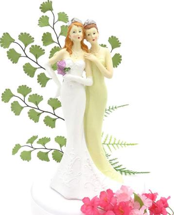 Prachtige vrouwen bruidspaar taarttopper. beschikbaar voor biedingen