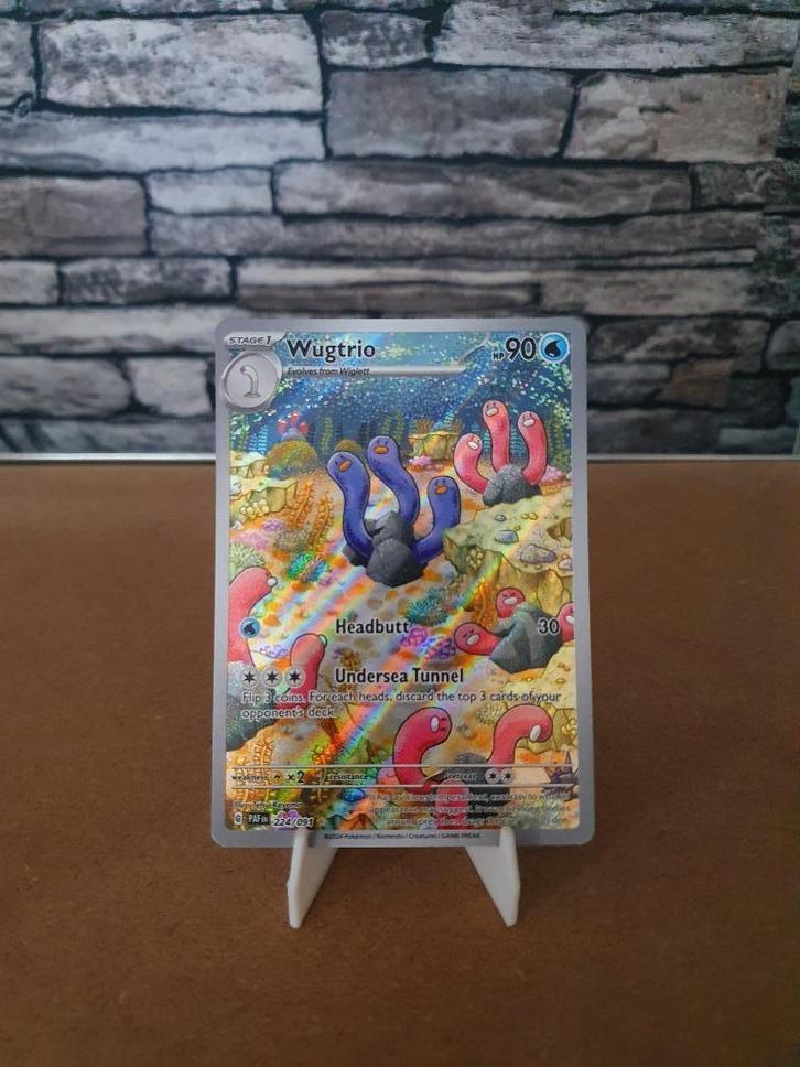 Pokémon Wugtrio 224/091 Engels Paldean Fates, Hobby en Vrije tijd, Verzamelkaartspellen | Pokémon, Nieuw, Losse kaart, Foil, Ophalen of Verzenden