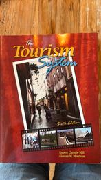 The Tourism System, Ophalen of Verzenden, Zo goed als nieuw