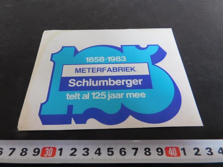 sticker meterfabriek SCHLUMBERGER telt al 125 jaar mee 1983*, Verzamelen, Stickers, Zo goed als nieuw, Bedrijf of Vereniging, Ophalen