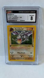 Pokemon Fossil Aerodactyl Holo PRERELEASE 1/62 - CGC 8, Ophalen of Verzenden, Nieuw