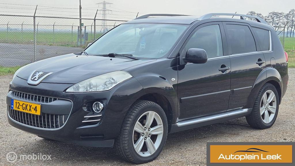 Peugeot 4007 2.2 HDiF GT 7PERSOONS 4x4 NAVI CLIMA TREKHAAK, Auto's, Peugeot, Gebruikt, 2000 kg, 7 stoelen, Zwart