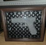 Schilderij pistool, Ophalen