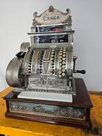 Antieke kassa "National" uit 1913 gerestaureerd., Ophalen