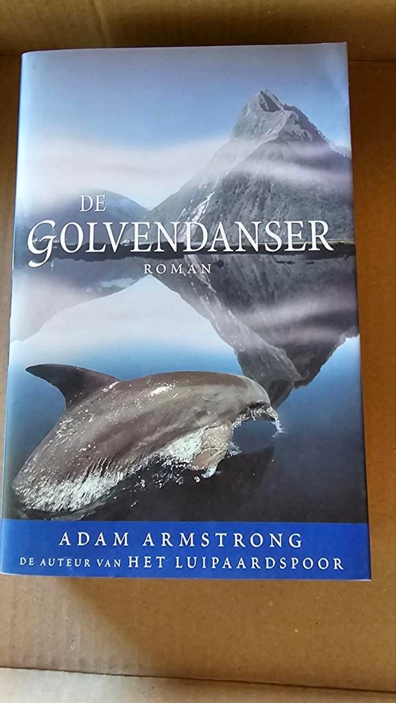 Adam Armstrong - De golvendanser, Boeken, Ophalen of Verzenden, Zo goed als nieuw, Adam Armstrong