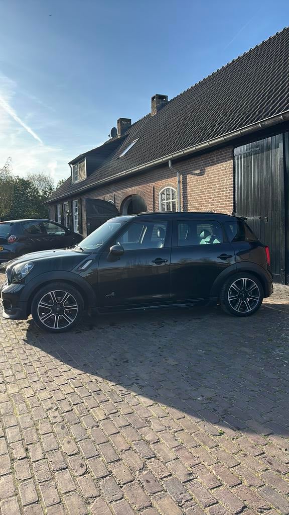 MINI Countryman JCW Aut. Pano Leder APK 12-2027, Auto's, Mini, 1380 kg, Zwart, Zwart, Vierwielaandrijving