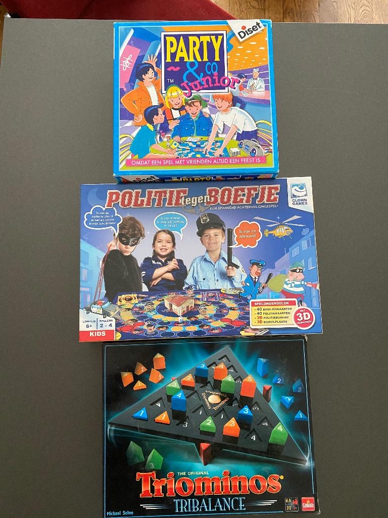 Bordspel Party&co. Triominos Politie tegen Boefje. Samen, Vijf spelers of meer, Ophalen of Verzenden, Zo goed als nieuw, Goliath