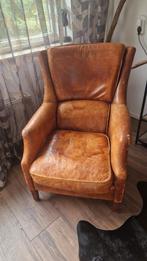 Schapenleren fauteuil, Ophalen