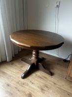 Klassieke ronde tafel met middenpoot, Ophalen
