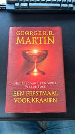 George R.R. Martin - Een feestmaal voor kraaien, Boeken, Ophalen of Verzenden, Zo goed als nieuw, George R.R. Martin