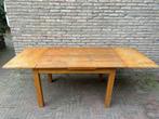Uitschuifbare houten eettafel, Ophalen