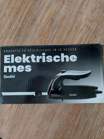 Electrisch  mes met 2 messen  beschikbaar voor biedingen