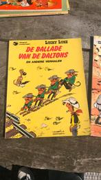 Strip boek daltons en blauwbloezen, Zo goed als nieuw, Ophalen