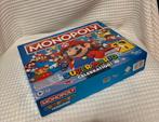 Monopoly Super Mario - Nieuwstaat!, Hobby en Vrije tijd, Gezelschapsspellen | Bordspellen, Drie of vier spelers, Ophalen of Verzenden