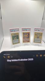 Psa 9 set gym heroes moltres lt surge en erika, Hobby en Vrije tijd, Verzamelkaartspellen | Pokémon, Ophalen of Verzenden, Nieuw