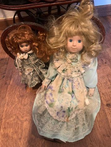 Te koop;  pop porseleinen hoofd  kado evt met kinderwagen beschikbaar voor biedingen