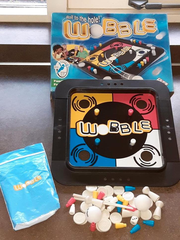 Wobble nieuwstaat, Hobby en Vrije tijd, Gezelschapsspellen | Bordspellen, Zo goed als nieuw, Ophalen of Verzenden