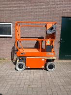 JLG 1230ES Masthoogwerker/schaarlift, Zakelijke goederen, Machines en Bouw | Liften, Steigers en Ladders, Ophalen