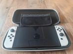 Nintendo Switch OLED met games en accessoires, Spelcomputers en Games, Games | Nintendo Switch, Gebruikt, Overige genres, 1 speler