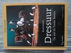 Basisboek dressuur, Ophalen of Verzenden, Zo goed als nieuw, 1 bandje