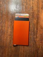 Secrid premium cardprotector fluted Orange, Ophalen of Verzenden, Zo goed als nieuw