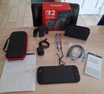Nintendo Switch 2 + Case + Garantie, Spelcomputers en Games, Spelcomputers | Nintendo Switch, Ophalen, Zo goed als nieuw, Met 2 controllers