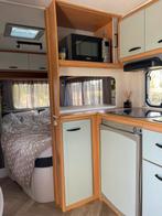 Knaus Sudwind 450 van 2002, gepimpt, opgeknapt, met voortent, Omvormbare zithoek, Particulier, 6 tot 7 meter, Knaus