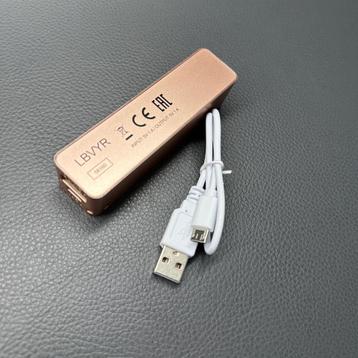 Powerbankje rosé voor extra stroom voor mobiel en tablet beschikbaar voor biedingen