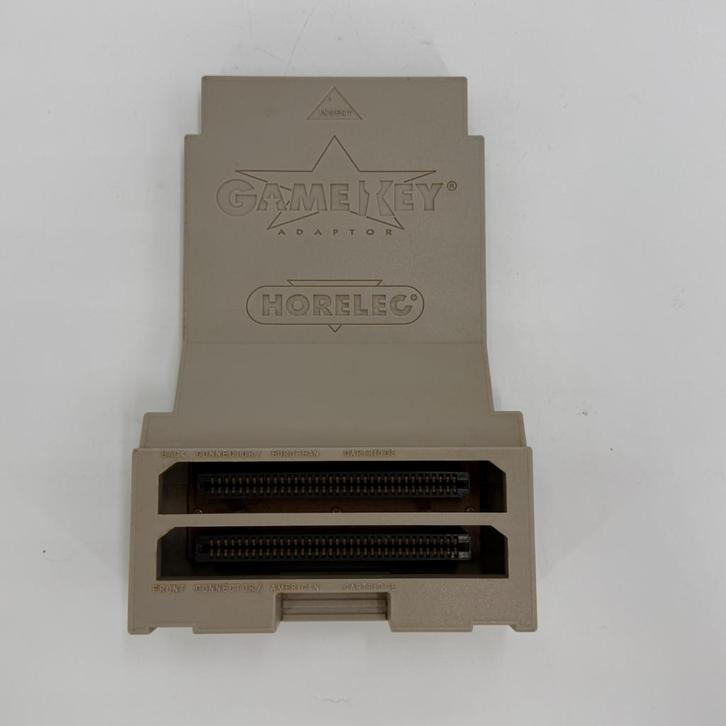 Horelec Gamekey Adapter voor Nintendo NES, Spelcomputers en Games, Games | Nintendo NES, Zo goed als nieuw