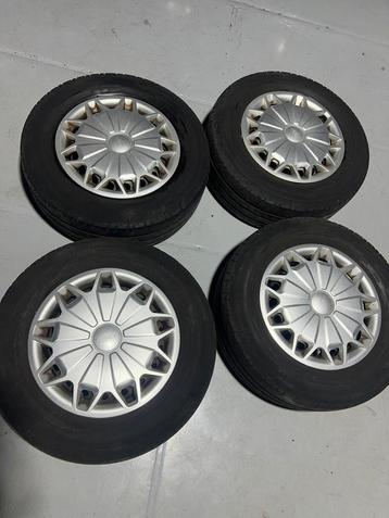 Ford transit banden set 215/65 R15, + Origineel doppen beschikbaar voor biedingen