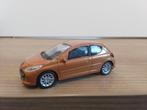 Welly.  PEUGEOT  207. goud metalic., Hobby en Vrije tijd, Modelauto's | 1:43, Overige merken, Ophalen of Verzenden, Zo goed als nieuw