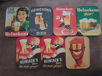 
7 heineken onderzetters  beschikbaar voor biedingen
