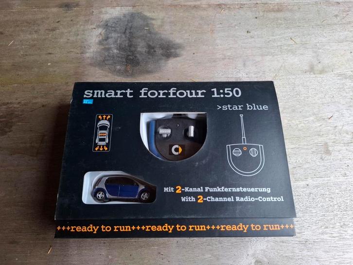 Schaalmodel smart forfour schaal 1:50 en rc bestuurbaar, Hobby en Vrije tijd, Modelauto's | 1:50, Nieuw, Bus of Vrachtwagen, Overige merken