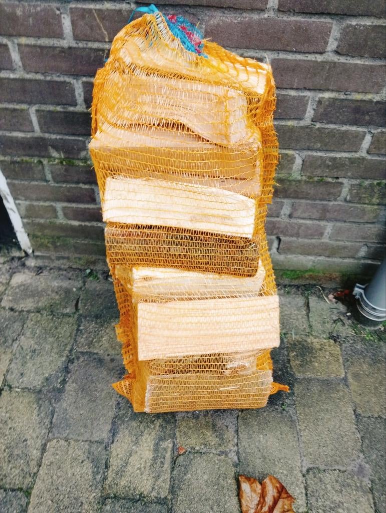 Zak met brandhout blokken, Tuin en Terras, Haardhout, Minder dan 3 m³, Ophalen of Verzenden, Overige houtsoorten, Blokken
