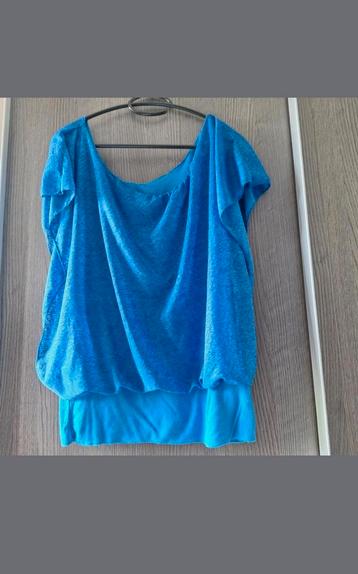Blouse met elastische boord onder  beschikbaar voor biedingen